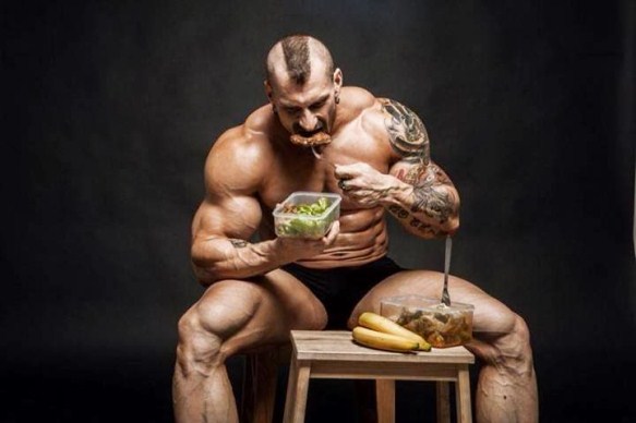 the recomposition diet how to build muscle and lose fat muscular guy eating